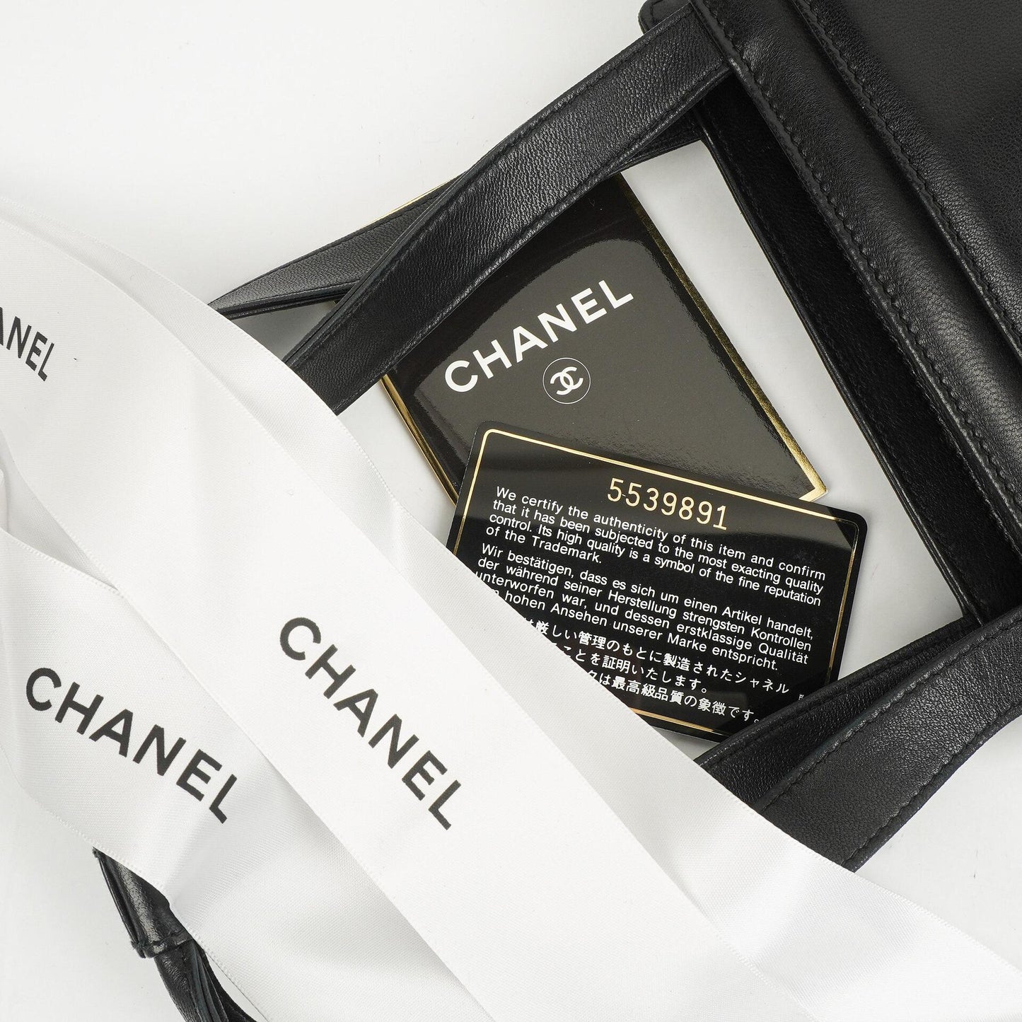 Chanel Camellia Top-Handle-Tasche aus schwarzem Leder