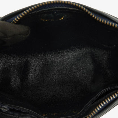 CHANEL Mini Barrel Quasten-Tasche aus schwarzem gestepptem Lammleder