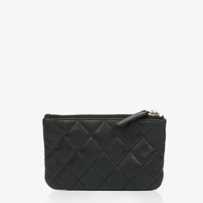 Chanel Kleine Cosmo Kosmetiktasche aus schwarzem gestepptem Lammleder