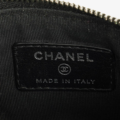Chanel Kleine Cosmo Kosmetiktasche aus schwarzem gestepptem Lammleder