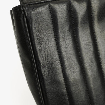 Chanel Kelly Vertical Klappentasche aus schwarzem gestepptem Lammleder mit 24K vergoldeten Beschlägen