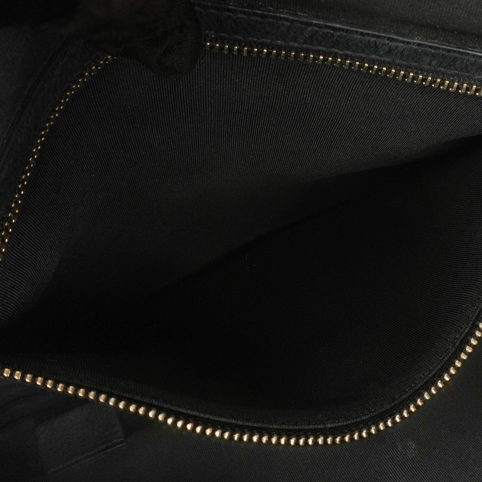 Chanel Boy Medium Clutch aus schwarzem gestepptem Caviar Leder