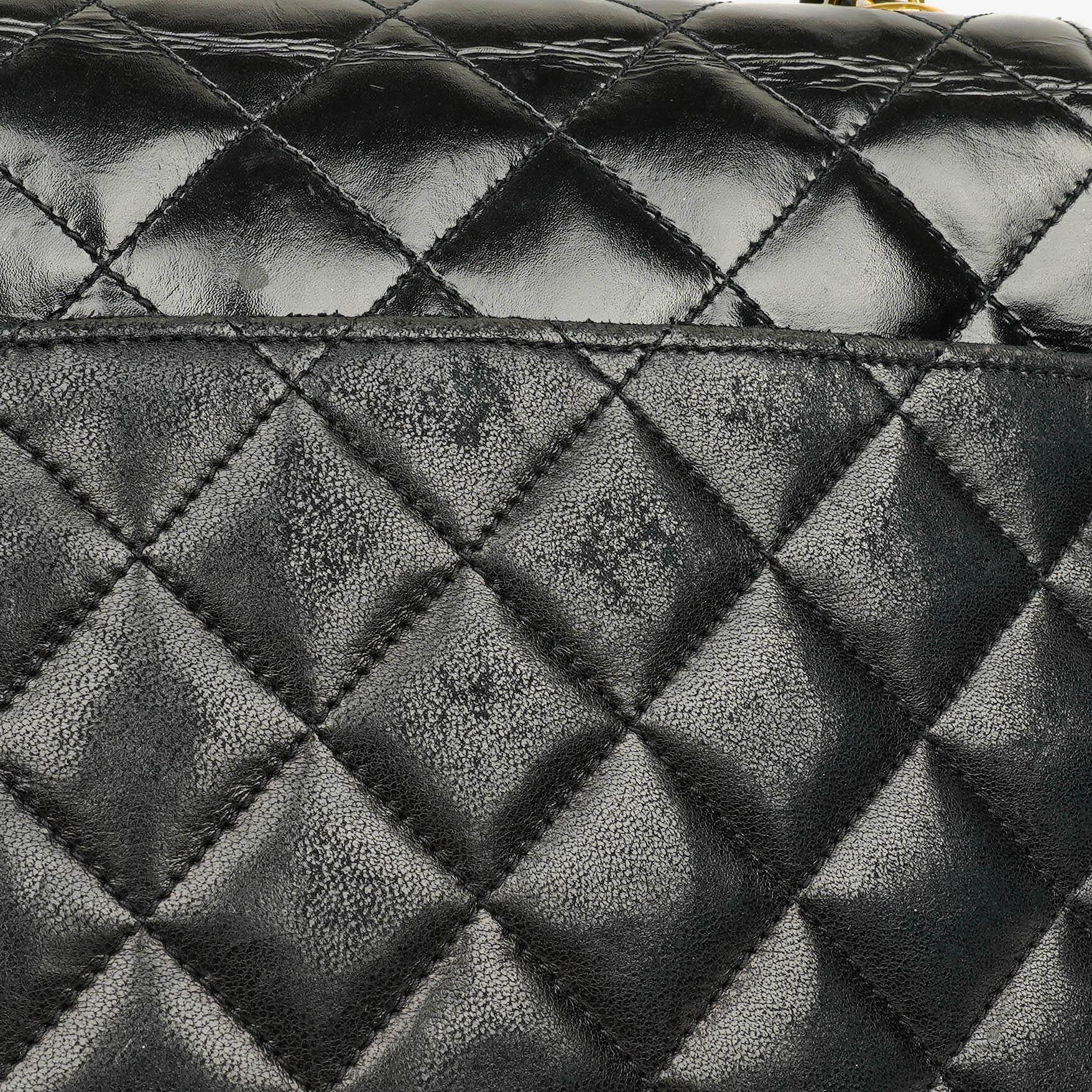 Chanel Square Single Flap Tasche aus schwarzem gestepptem Leder
