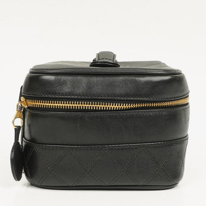 Chanel Vanity Case aus schwarzem gestepptem Leder