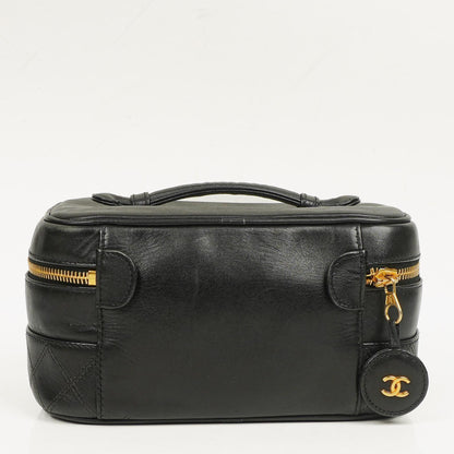 Chanel Vanity Case aus schwarzem gestepptem Leder