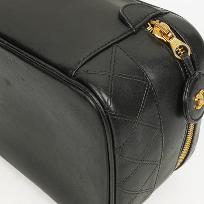 Chanel Vanity Case aus schwarzem gestepptem Leder