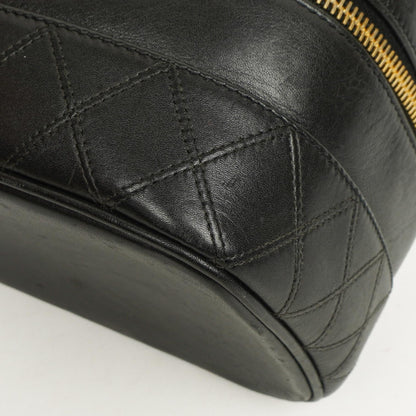 Chanel Vanity Case aus schwarzem gestepptem Leder
