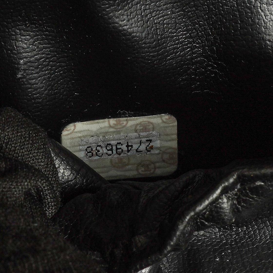Chanel Vanity Case aus schwarzem gestepptem Leder