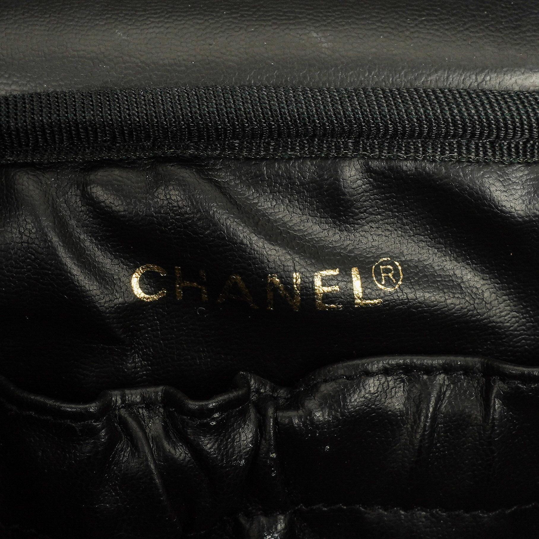 Chanel Vanity Case aus schwarzem gestepptem Leder