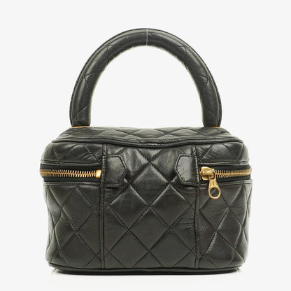 Chanel schwarzer gesteppter Kosmetikkoffer aus Leder