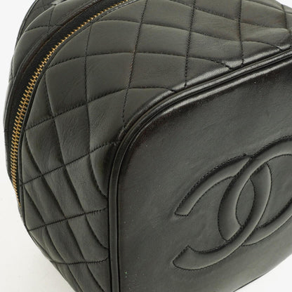 Chanel schwarzer gesteppter Kosmetikkoffer aus Leder