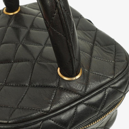 Chanel schwarzer gesteppter Kosmetikkoffer aus Leder