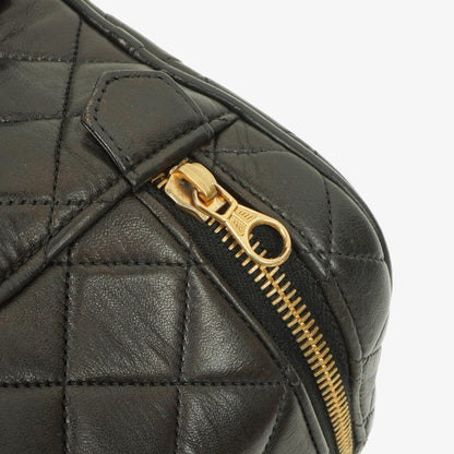 Chanel schwarzer gesteppter Kosmetikkoffer aus Leder