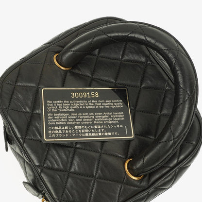 Chanel schwarzer gesteppter Kosmetikkoffer aus Leder