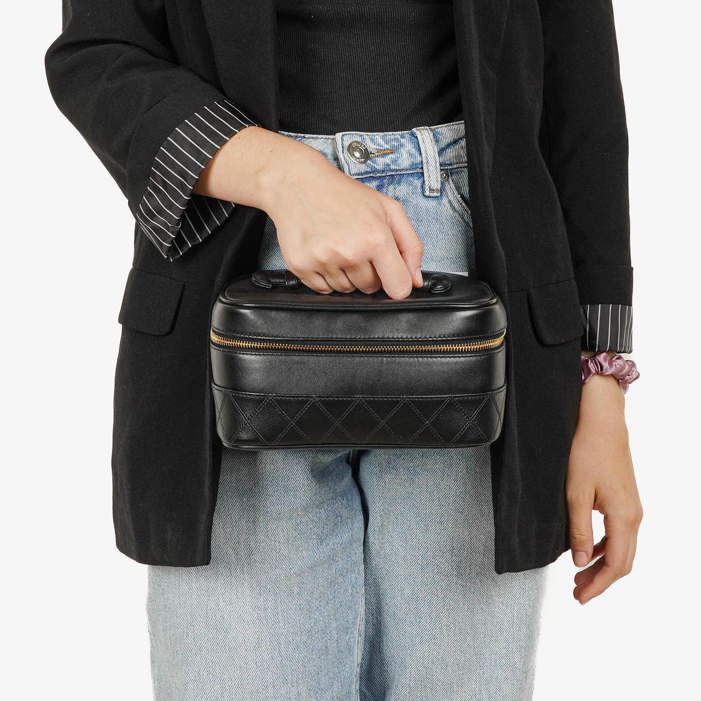 Chanel Vanity Case aus schwarzem gestepptem Leder