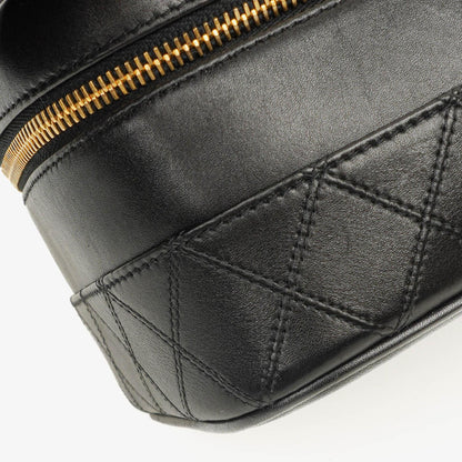 Chanel Vanity Case aus schwarzem gestepptem Leder