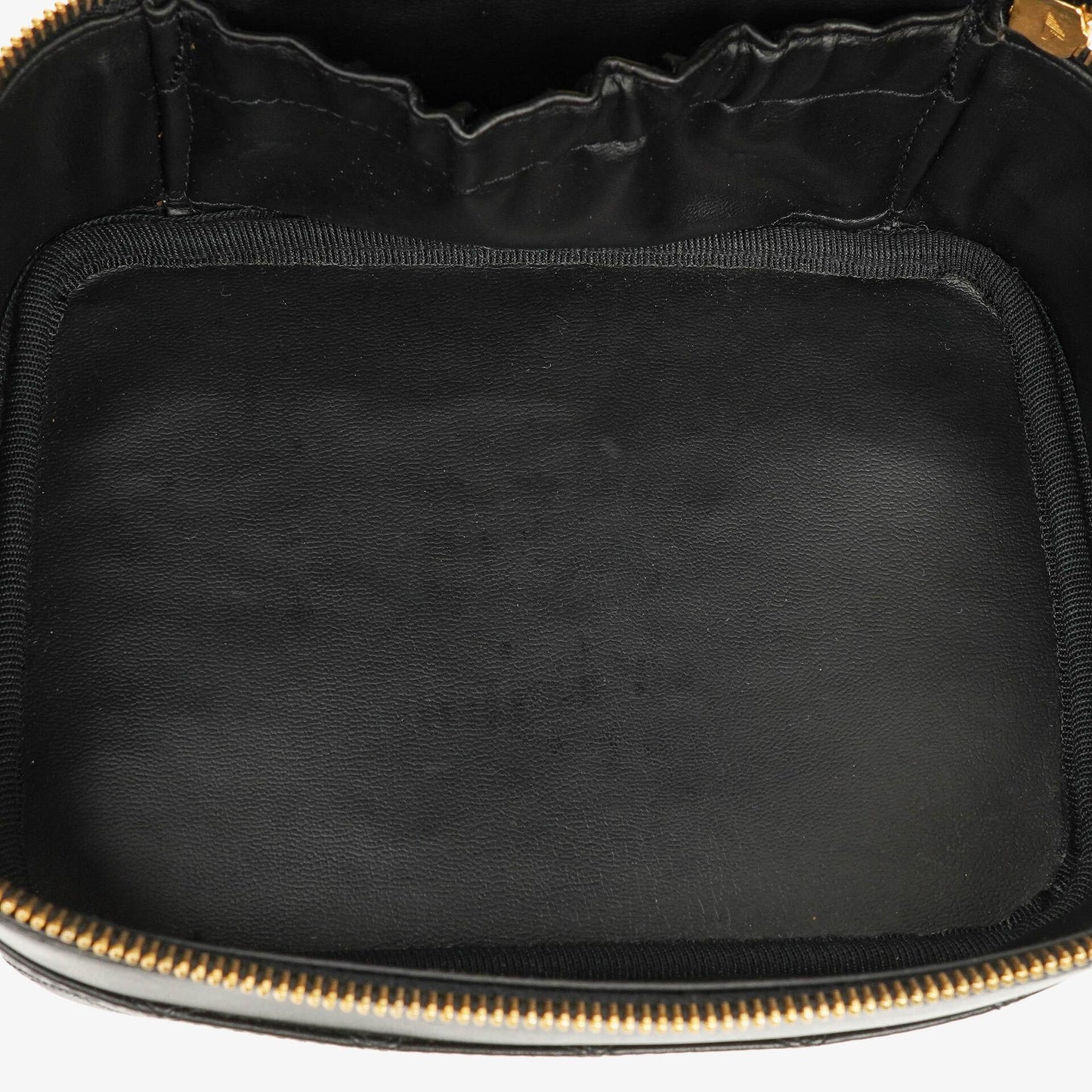 Chanel Vanity Case aus schwarzem gestepptem Leder
