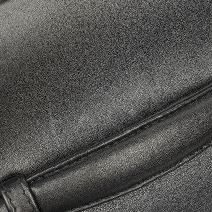 Chanel Vanity Case aus schwarzem gestepptem Leder