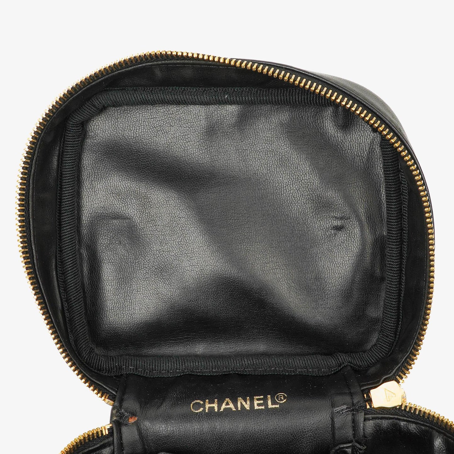 Chanel Kosmetikkoffer aus schwarzem gestepptem Leder