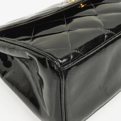 Chanel CC Flap Doppelketten-Tasche aus schwarzem gestepptem Patentleder