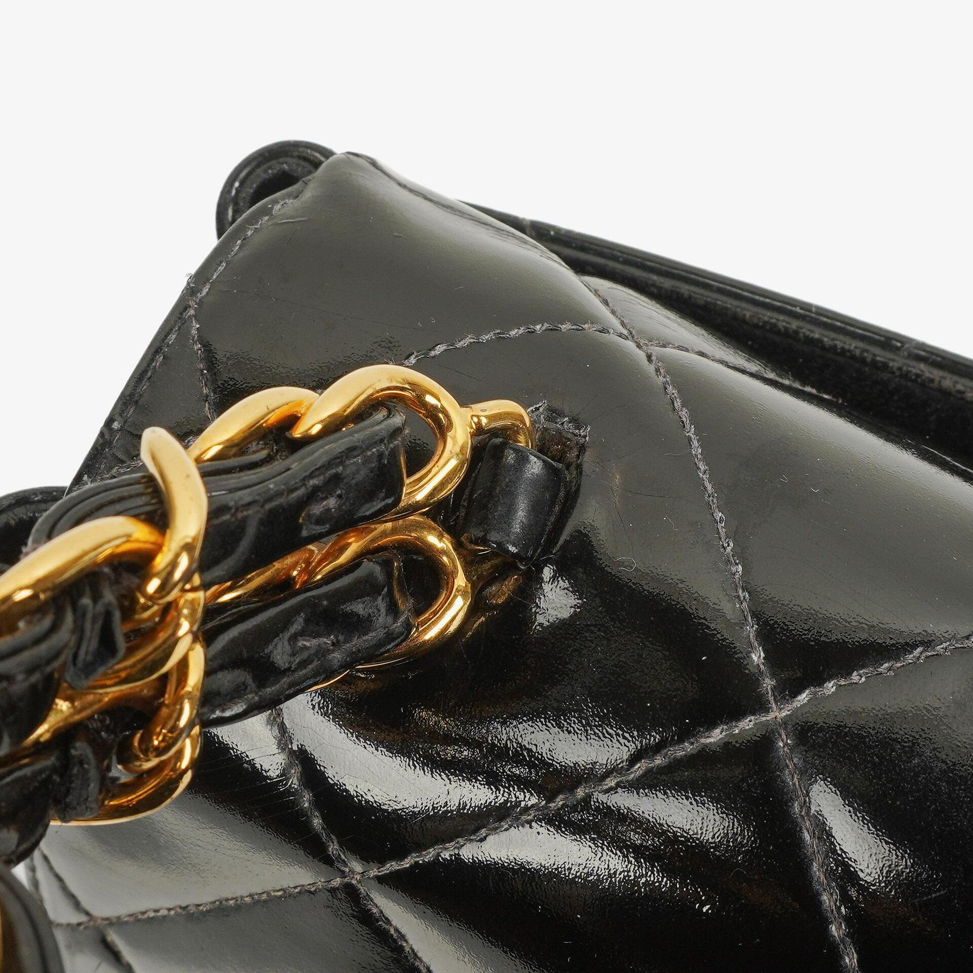 Chanel CC Flap Doppelketten-Tasche aus schwarzem gestepptem Patentleder