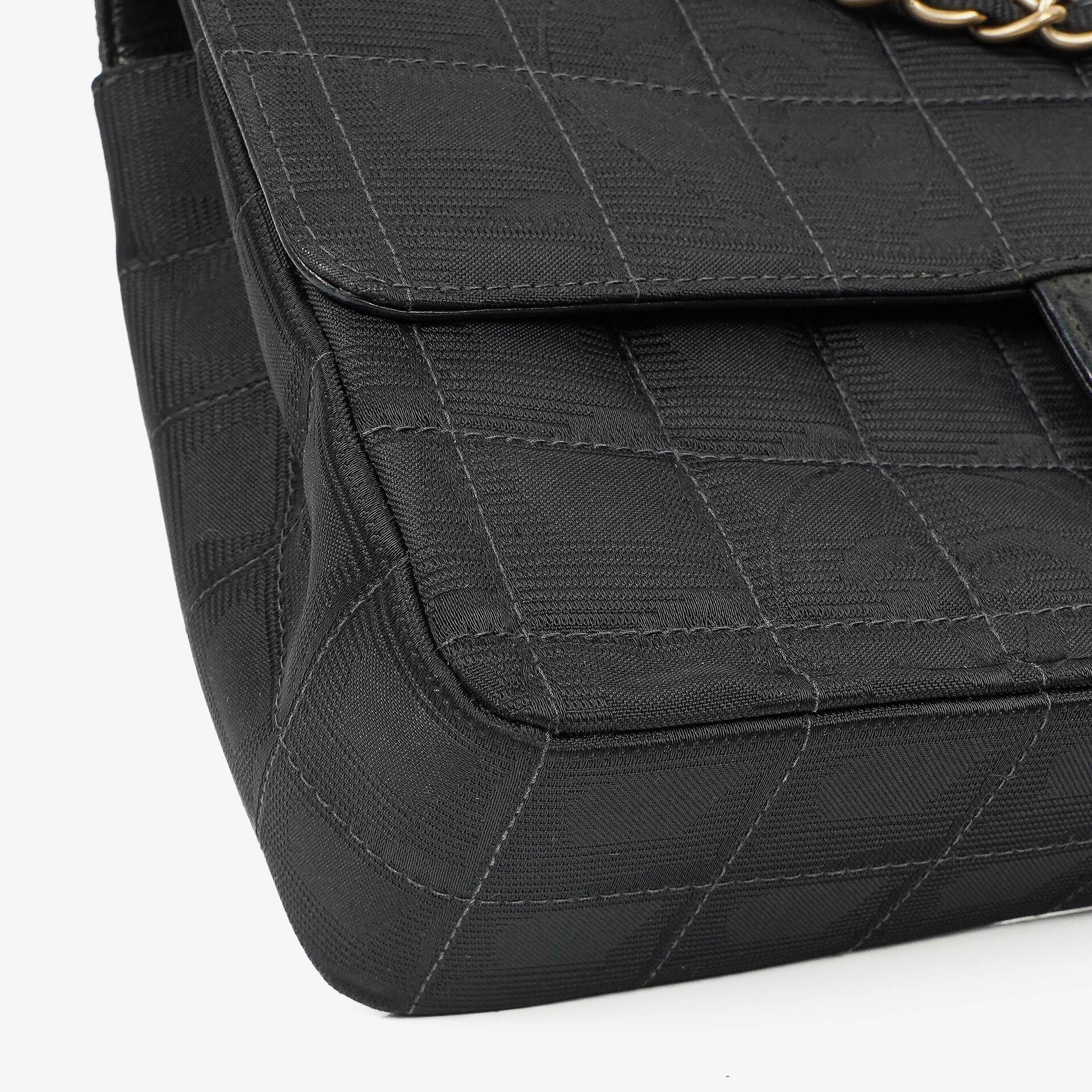 Chanel Travel Line Chocolate Bar Single Flap Tasche in Schwarz