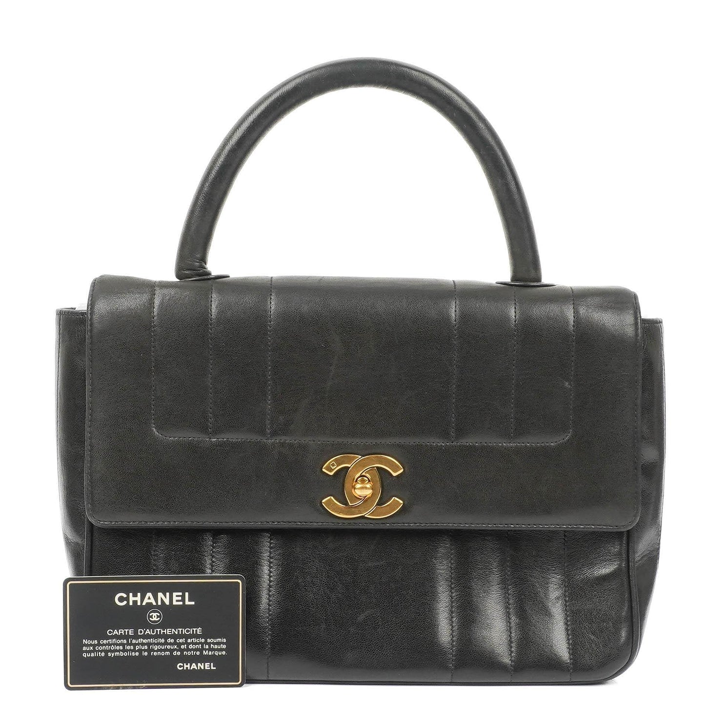 Chanel Kelly Flap Tasche aus schwarzem vertikal gestepptem Lammleder