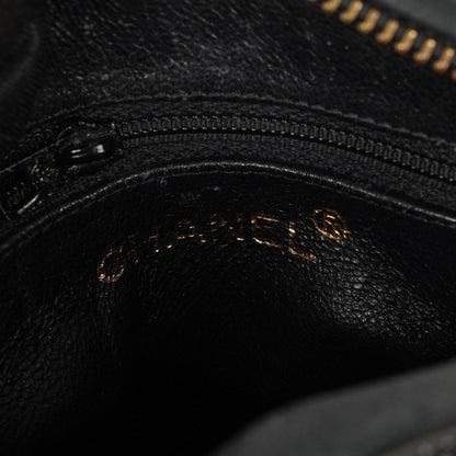 Chanel Camera CC kleine Schultertasche aus schwarzem Lackleder mit Quaste