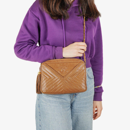 Chanel Camera Umhängetasche aus braunem Leder mit Quaste