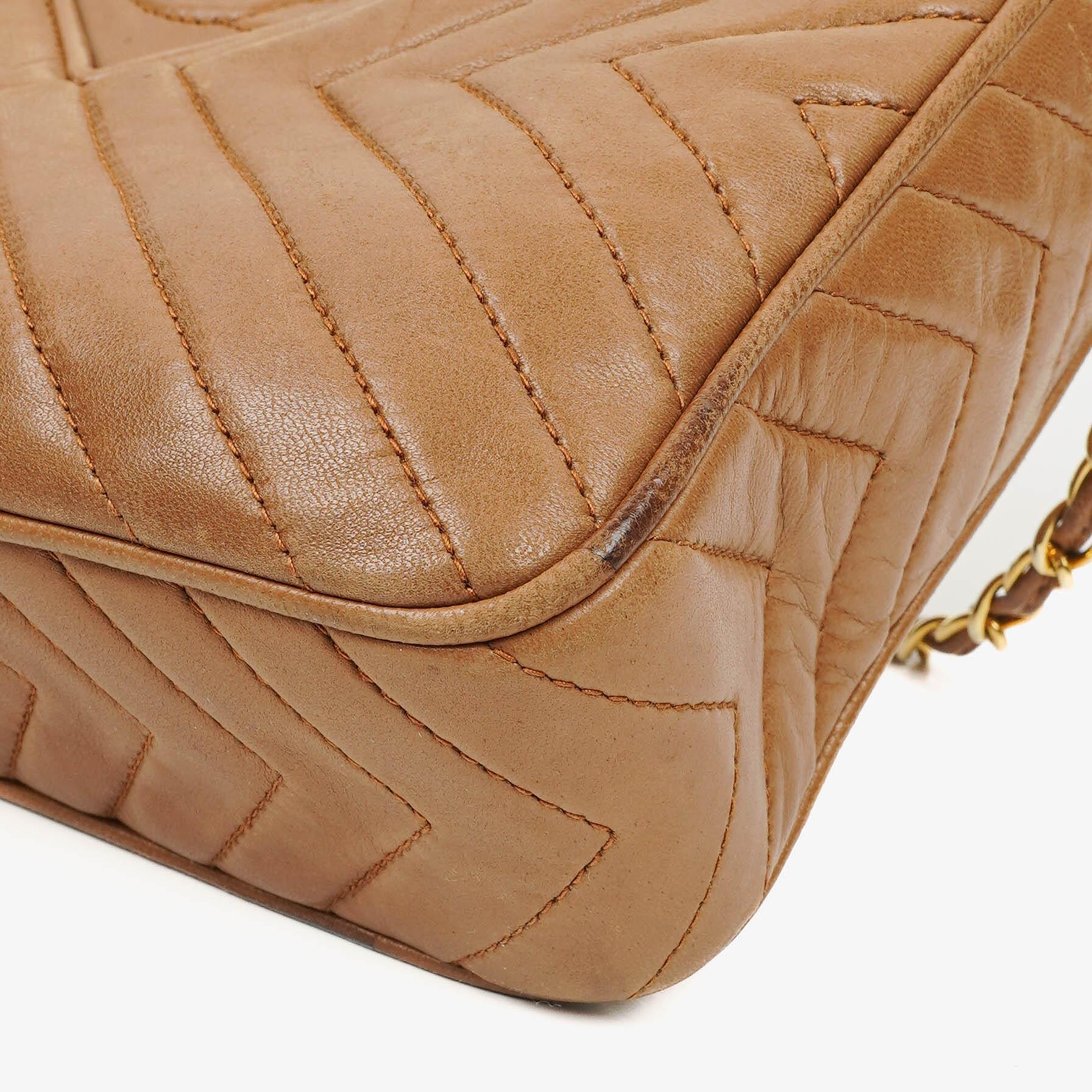 Chanel Camera Umhängetasche aus braunem Leder mit Quaste