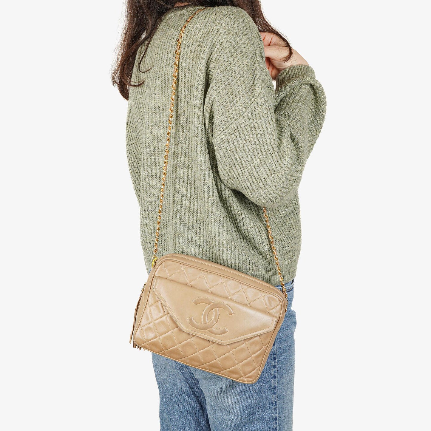 Chanel Camera Tasche aus beigem gestepptem Lammleder mit Quaste und CC