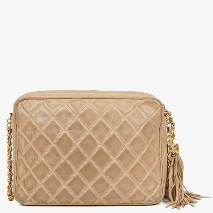 Chanel Camera Tasche aus beigem gestepptem Lammleder mit Quaste und CC