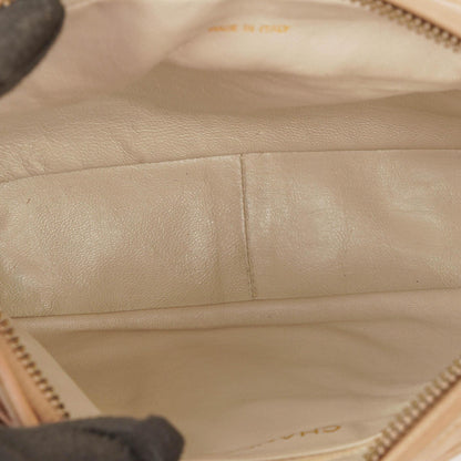 Chanel Camera Tasche aus beigem gestepptem Lammleder mit Quaste und CC