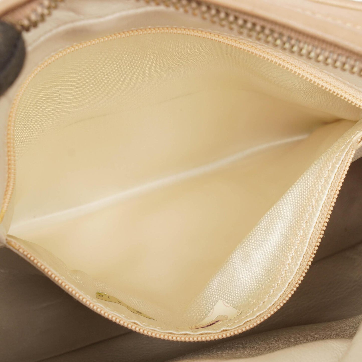 Chanel Camera Tasche aus beigem gestepptem Lammleder mit Quaste und CC