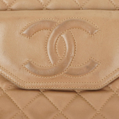 Chanel Camera Tasche aus beigem gestepptem Lammleder mit Quaste und CC