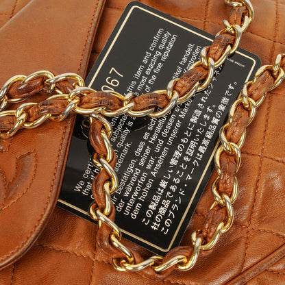 Chanel Small Camera Tasche aus braunem gestepptem Lammleder mit Quaste und CC-Fronttasche