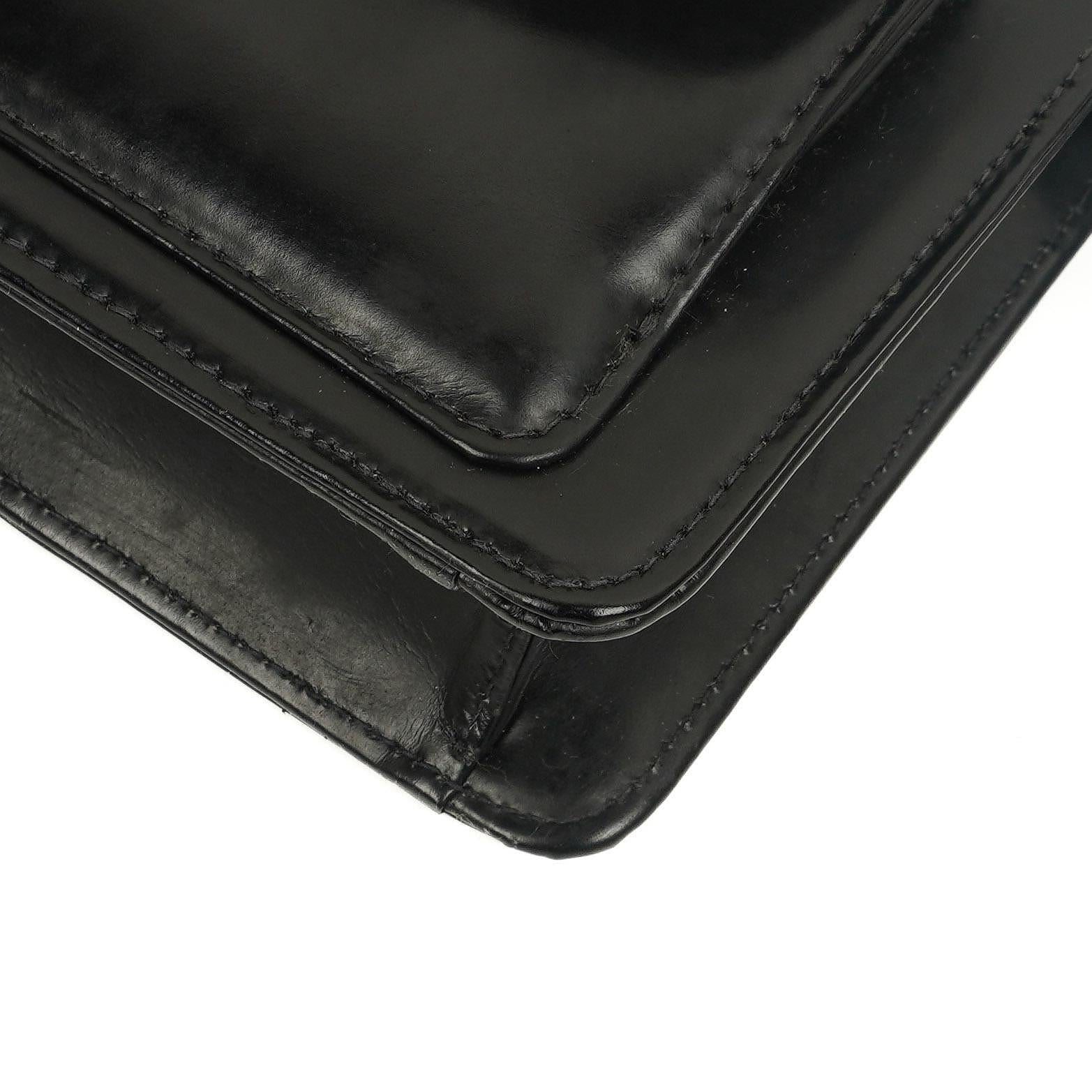 Chanel CC Schwarze Leder Clutch 24K Goldbeschläge, 1996-1997