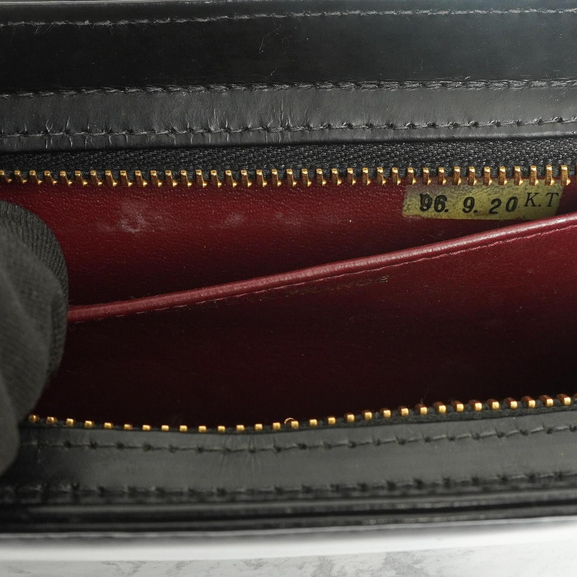 Chanel CC Schwarze Leder Clutch 24K Goldbeschläge, 1996-1997