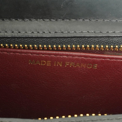 Chanel CC Schwarze Leder Clutch 24K Goldbeschläge, 1996-1997