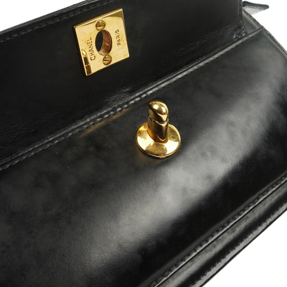 Chanel CC Schwarze Leder Clutch 24K Goldbeschläge, 1996-1997