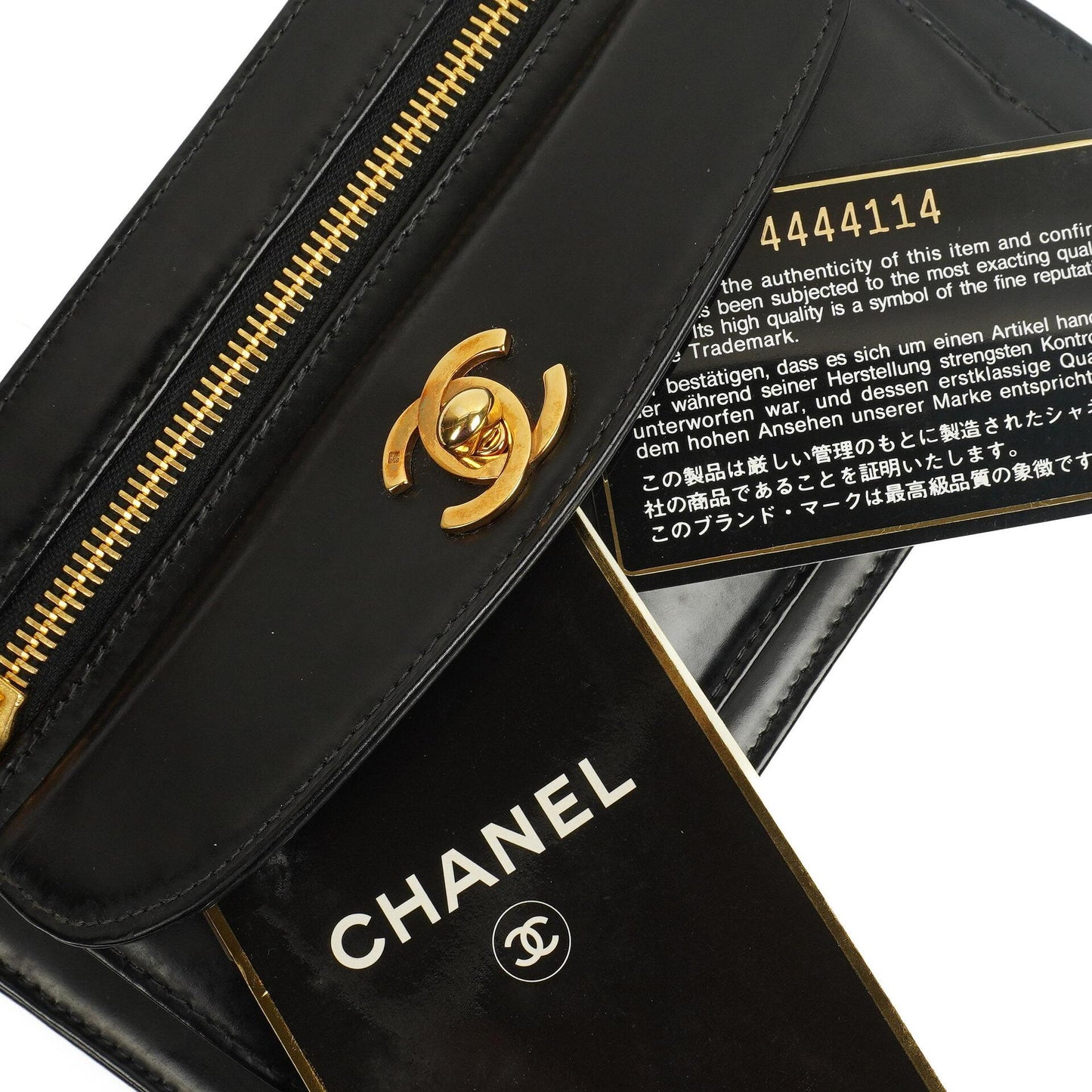 Chanel CC Schwarze Leder Clutch 24K Goldbeschläge, 1996-1997
