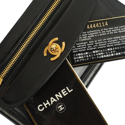 Chanel CC Schwarze Leder Clutch 24K Goldbeschläge, 1996-1997
