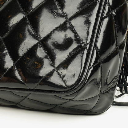 Chanel CC Camera Tassel Tasche aus schwarzem gestepptem Lackleder