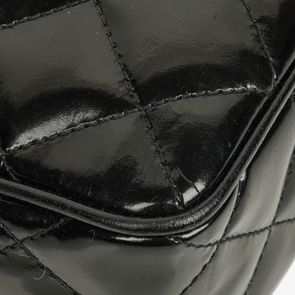 Chanel CC Camera Tassel Tasche aus schwarzem gestepptem Lackleder