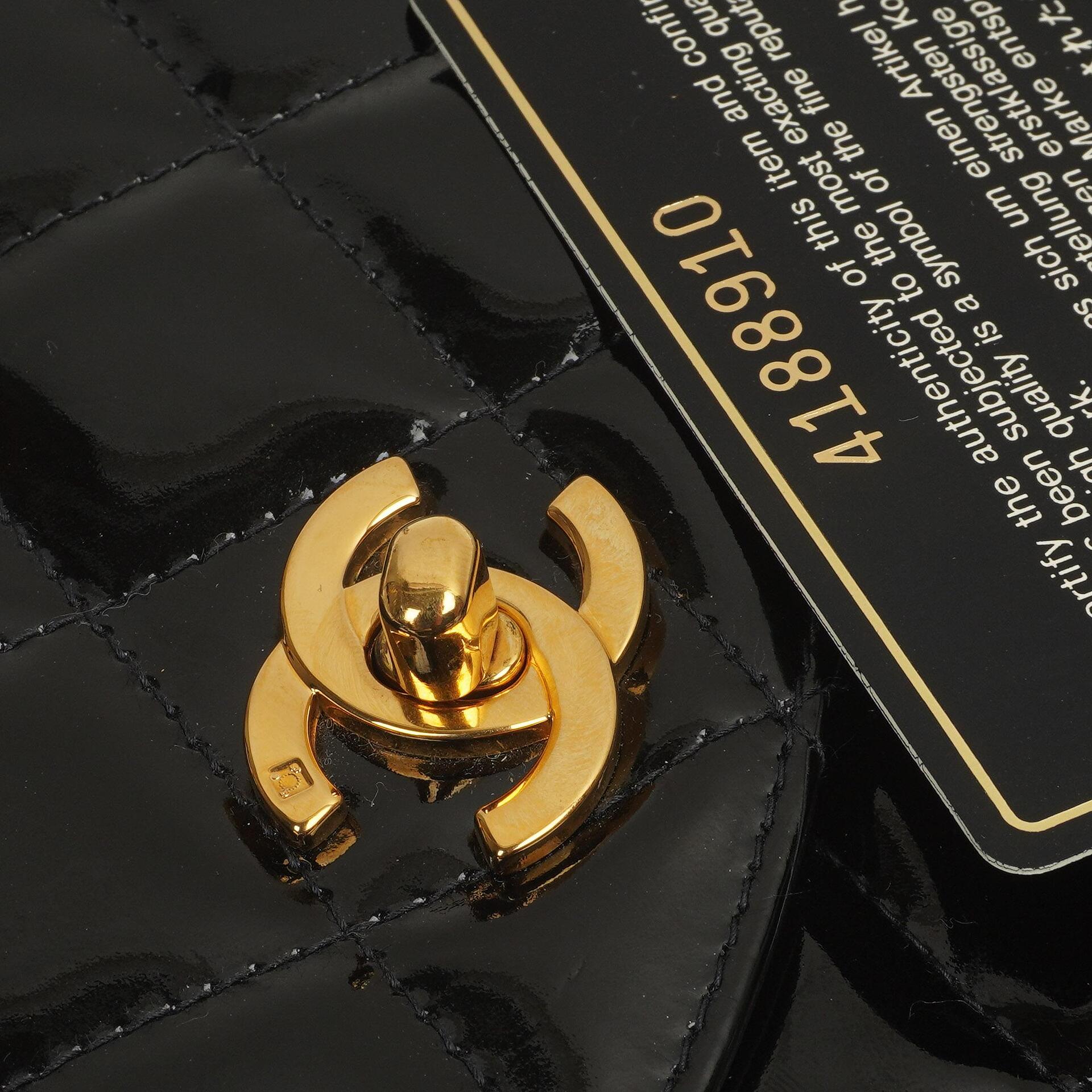 Chanel Ketten-Top-Handle Einzelklappen-Tasche Schwarz gestepptes Lackleder mit 24K goldplattierter Hardware