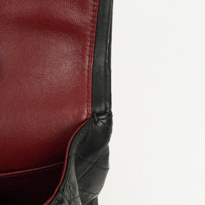CHANEL Classic Double Flap Tasche aus schwarzem gestepptem Lammleder mit 24K vergoldeter Hardware