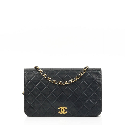 Chanel Classic Flap Bag aus schwarzem gestepptem Lammleder mit goldfarbener Hardware