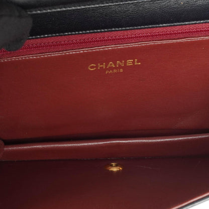 Chanel Classic Flap Bag aus schwarzem gestepptem Lammleder mit goldfarbener Hardware