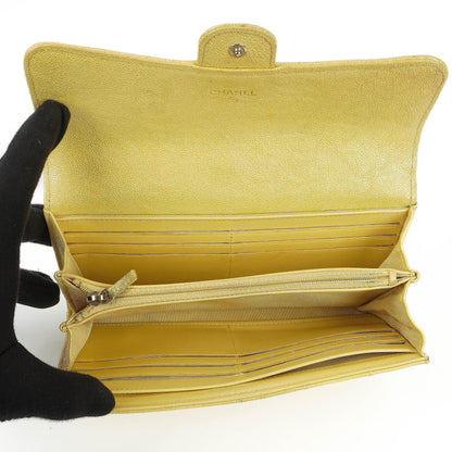 Chanel Classic Flap Geldbörse Petite Maroquinerie aus metallic-gelbem gestepptem Caviar-Leder