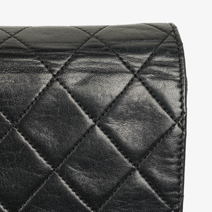 Chanel Classic Vollklappentasche aus schwarzem gestepptem Lammleder mit 24K vergoldeten Beschlägen